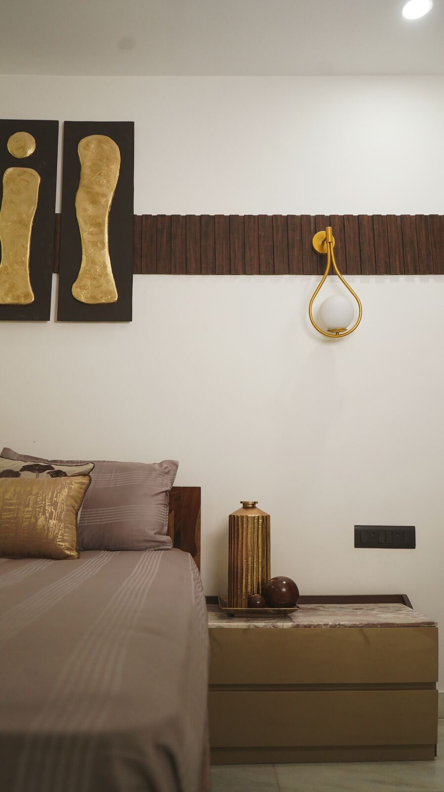 Samsara Residence bedroom nightstand with gold accents