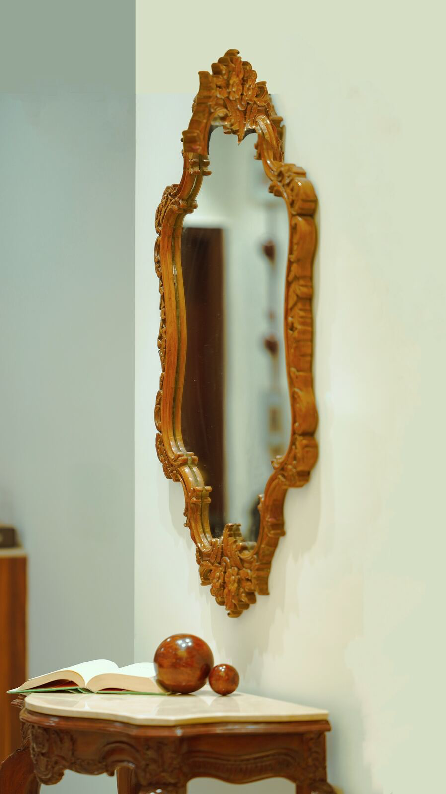 Samsara Residence lounge with carved antique mirror